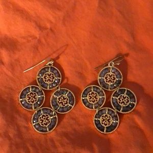 Gold earrings with gray stones